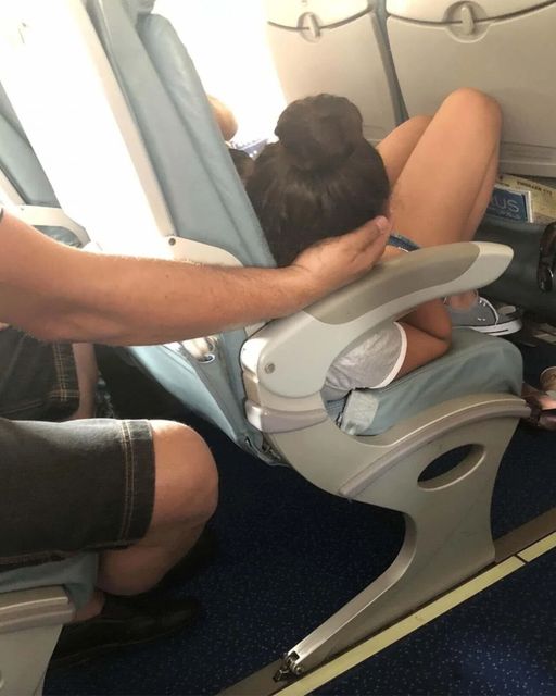 Photo Of Dad With Daughter On Flight Sparks Online Debate After People Spot Small Detail