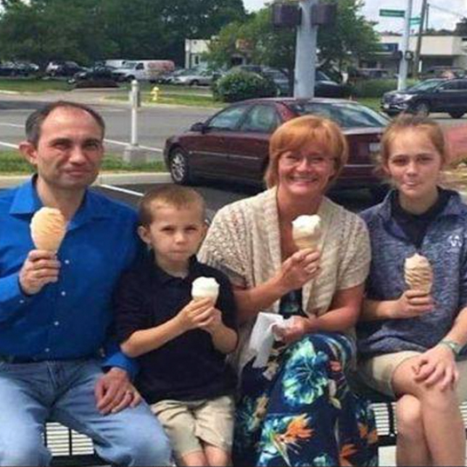 This family of 4 were out for ice cream when a stranger spotted them and offered to take their picture. Days later, she got a message that made her blood run cold.  See the message, and the distressing detail in the picture.