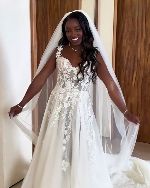 The Olympic gold medalist faced backlash over her hair in her wedding photos, despite wearing a stunning $120 dress for the most important day of her life.