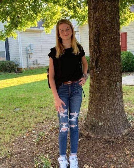 A mother took this photo of her daughter in the backyard and uploaded it to Facebook. But when she looked closer at the picture, she was terrified and froze. Here’s what they noticed in the picture: